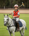 Boy Wearing Full Polo Kit on Horse Mockup