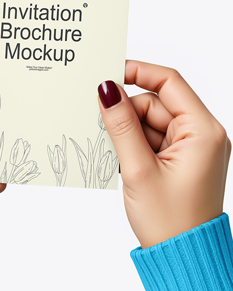 Brochure in a Hand Mockup