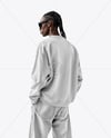 Man Wearing an Oversize Sweatshirt and Jeans Mockup