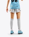 Female Soccer Player Wearing Jersey and Shorts Mockup