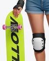 Young Woman in Protective Gear with Skateboard Mockup