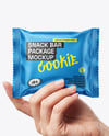 Metallic Snack Pack in a Hand Mockup