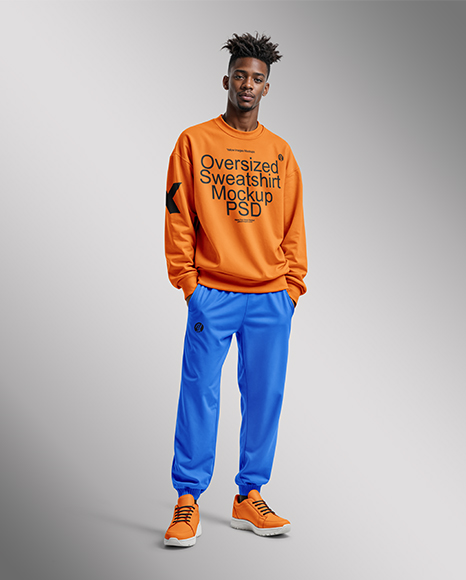 Black Man Wearing an Oversize Sweatshirt and Sweatpants Mockup