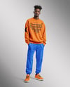 Black Man Wearing an Oversize Sweatshirt and Sweatpants Mockup