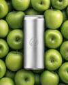 8.5oz Slim Drink Can on a Stack of Green Apples Mockup