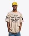 Black Man Wearing Oversized T-Shirt and Baseball Cap Mockup