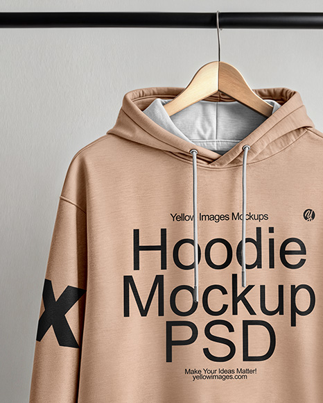 Hoodie on a Wooden Hanger Against a Plain Background Mockup