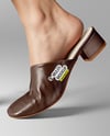 Pair of Mules on Woman's Legs Mockup