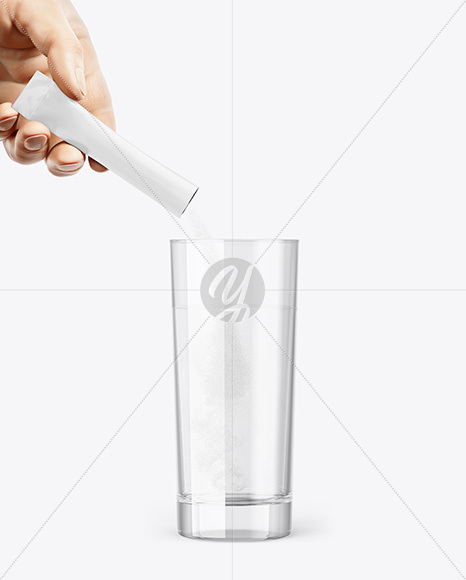Matte Stick Sachet With Powder in a Hand & Water Glass Mockup
