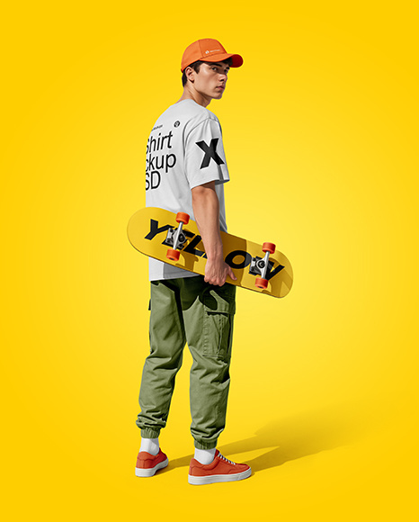 Young Man Wearing T-Shirt and Cargo Pants Holding Skateboard Mockup
