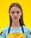 Young Woman Wearing Apron and T-Shirt Mockup
