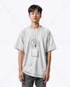 Young Man Wearing T-shirt with ID Card Mockup