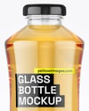 Glass Bottle with Apple Juice Mockup