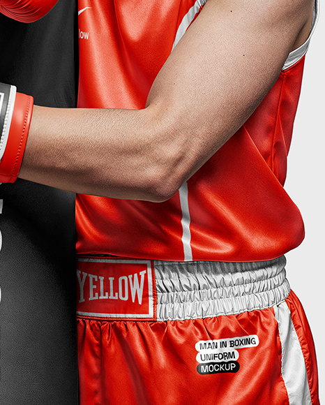 Man Wearing Boxing Uniform with Punching Bag Mockup
