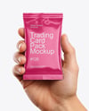 Glossy Trading Card Pack in a Hand Mockup