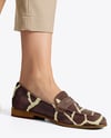 Pair of Suede Loafers on Woman's Legs Mockup
