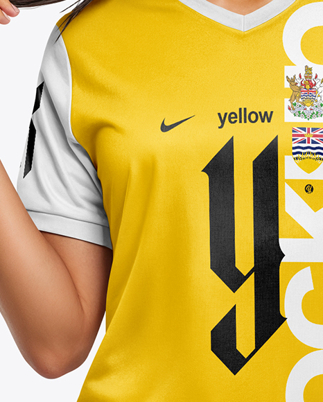 Female Soccer Player Wearing Jersey and Shorts Mockup