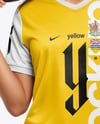 Female Soccer Player Wearing Jersey and Shorts Mockup