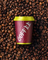 9oz Paper Cup on a Stack of Coffee Beans Mockup