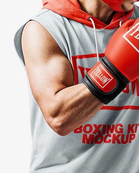 Man Wearing Boxing Sleeveless Hoodie and Shorts with Punching Bag Mockup