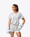 Female UFC Fighter Wearing T-Shirt & Shorts Mockup
