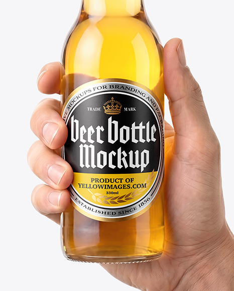 Clear Glass Beer Bottle in a Hand Mockup