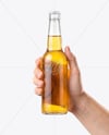Clear Glass Beer Bottle in a Hand Mockup