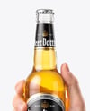 Clear Glass Beer Bottle in a Hand Mockup
