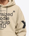 Young Man Wearing Oversize Hoodie and Beanie Hat Mockup