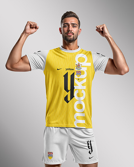 Man Wearing Soccer Jersey and Shorts Mockup