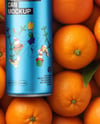 8.5oz Slim Drink Can on a Stack of Oranges Mockup