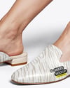 Pair of Leather Mules on Woman's Legs Mockup