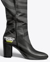 Pair of High-Knee Boots on Women's Legs with Dress Mockup