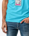 Smiling Man Wearing T-Shirt with Badge Mockup
