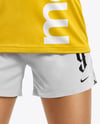 Woman Wearing Soccer Jersey and Shorts Mockup