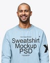 Man Wearing a Sweatshirt and Pants Mockup