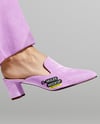 Pair of Suede Mules on Woman's Legs Mockup