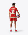 Man Wearing Full Volleyball Kit with Ball Mockup