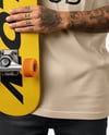 Young Man Wearing T-Shirt and Holding Skateboard Mockup