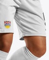 Soccer Player Wearing Crew Neck Jersey and Shorts Mockup