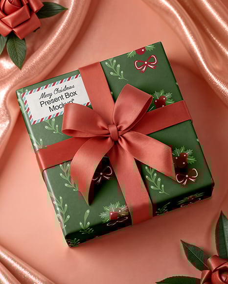 Christmas Gift Box with Pink Bow Mockup - Textured+Gift+Box+With+Apple+iPhone+X+Mockup+-+Top+View+in+...