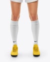 Woman Wearing Soccer Jersey and Shorts Mockup