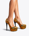 Pair of Stilettos on Woman's Legs Mockup