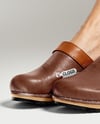 Pair of Clogs on Woman's Legs with Jeans Mockup