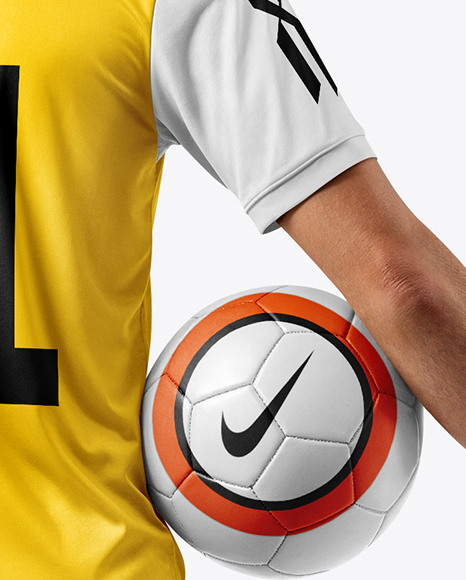 Man Wearing Soccer Jersey and Shorts Mockup