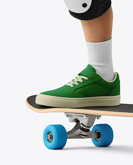 Boy Wearing T-Shirt and Shorts with Skateboard Mockup