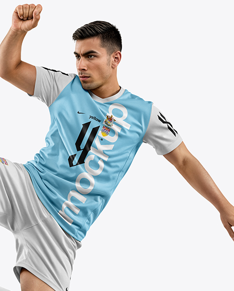 Man Wearing Soccer Jersey and Shorts Mockup