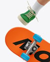 Boy Wearing T-Shirt and Shorts with Skateboard Mockup