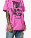 Woman with Mohawk & Tattoo Wearing T-shirt and Ripped Jeans Mockup