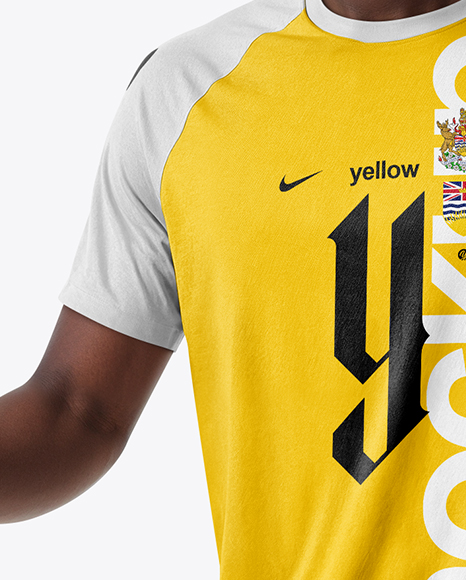 Soccer Player Wearing Raglan Jersey and Shorts Mockup